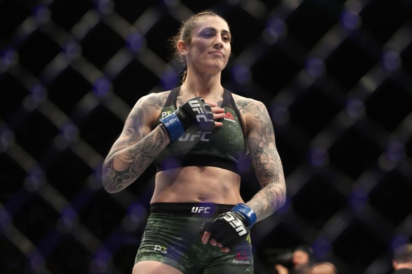 INGLEWOOD, CA - DECEMBER 29: Megan Anderson of Australia celebrates her victory over Cat Zingano in their women's featherweight bout during the UFC 232 event inside The Forum on December 29, 2018 in Inglewood, California. (Photo by Christian Petersen/Zuffa LLC/Zuffa LLC via Getty Images)
