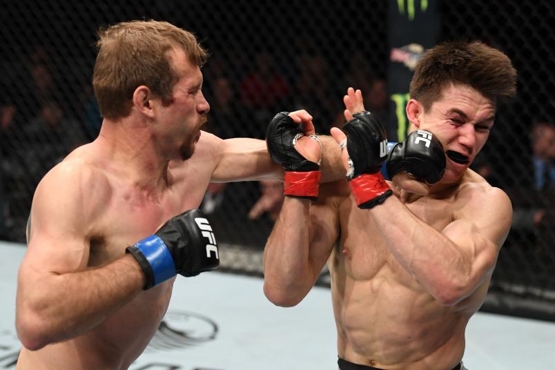 NEW YORK, NY - JANUARY 19: (L-R) Donald Cerrone punches Alexander Hernandez in their lightweight bout during the UFC Fight Night event at the Barclays Center on January 19, 2019 in the Brooklyn borough of New York City. (Photo by Josh Hedges/Zuffa LLC/Zuffa LLC via Getty Images)