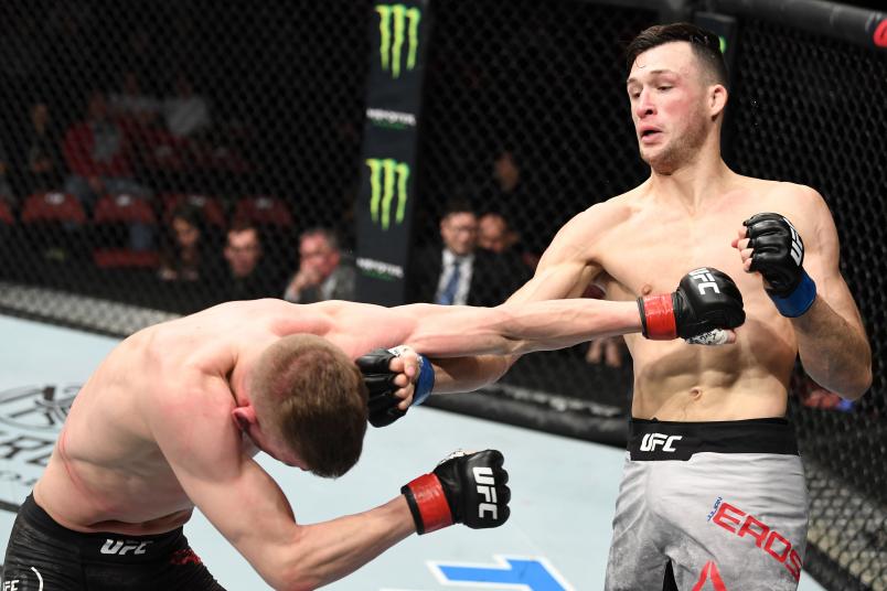WICHITA, KS - MARCH 09: (R-L) Julian Erosa punches Grant Dawson in their featherweight bout during the UFC Fight Night event at Intrust Bank Arena on March 9, 2019 in Wichita, Kansas. (Photo by Josh Hedges/Zuffa LLC/Zuffa LLC via Getty Images)