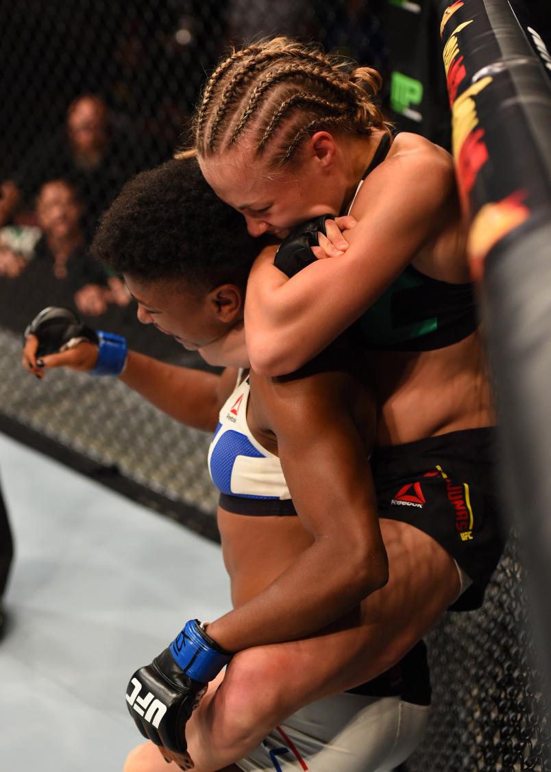 (R-L) Rose Namajunas submits Angela Hill in their women's strawweight bout during the UFC 192 event at the Toyota Center on October 3, 2015 in Houston, Texas. (Photo by Josh Hedges/Zuffa LLC)