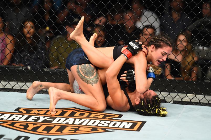 DALLAS, TX - SEPTEMBER 08: (L-R) Tatiana Suarez elbows Carla Esparza in their women's strawweight fight during the UFC 228 event at American Airlines Center on September 8, 2018 in Dallas, Texas. (Photo by Josh Hedges/Zuffa LLC/Zuffa LLC via Getty Images)