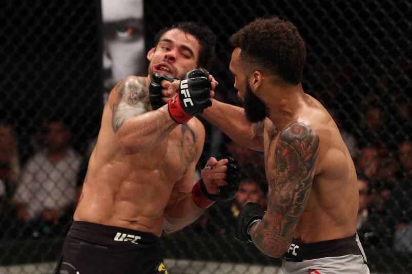 SAO PAULO, BRAZIL - SEPTEMBER 22: (R-L) Andre Ewell punches Renan Barao of Brazil in their bantamweight bout during the UFC Fight Night event at Ibirapuera Gymnasium on September 22, 2018 in Sao Paulo, Brazil. (Photo by Buda Mendes/Zuffa LLC/Zuffa LLC via Getty Images)