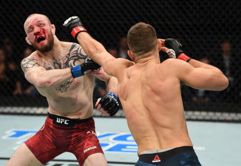 Calvin Kattar punches Chris Fishgold of England in their featherweight bout during the UFC Fight Night event inside Avenir Centre on October 27, 2018 in Moncton, New Brunswick, Canada. (Photo by Jeff Bottari/Zuffa LLC)