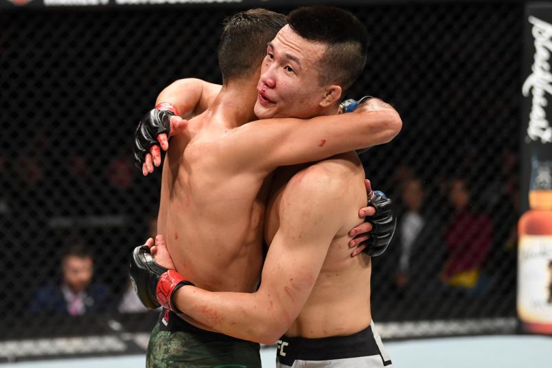 DENVER, CO - NOVEMBER 10: (R-L) Chan Sung Jung of South Korea and Yair Rodriguez of Mexico embrace in their featherweight bout during the UFC Fight Night event inside Pepsi Center on November 10, 2018 in Denver, Colorado. (Photo by Josh Hedges/Zuffa LLC/Zuffa LLC via Getty Images)