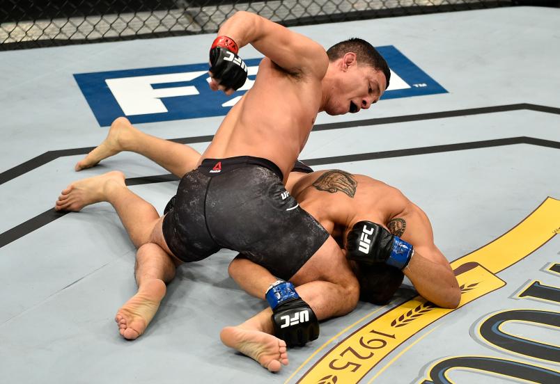 LAS VEGAS, NV - NOVEMBER 30: (L-R) Joseph Benavidez punches Alex Perez during The Ultimate Fighter Finale event inside The Pearl concert theater at Palms Casino Resort on November 30, 2018 in Las Vegas, Nevada. (Photo by Chris Unger/Zuffa LLC/Zuffa LLC via Getty Images)