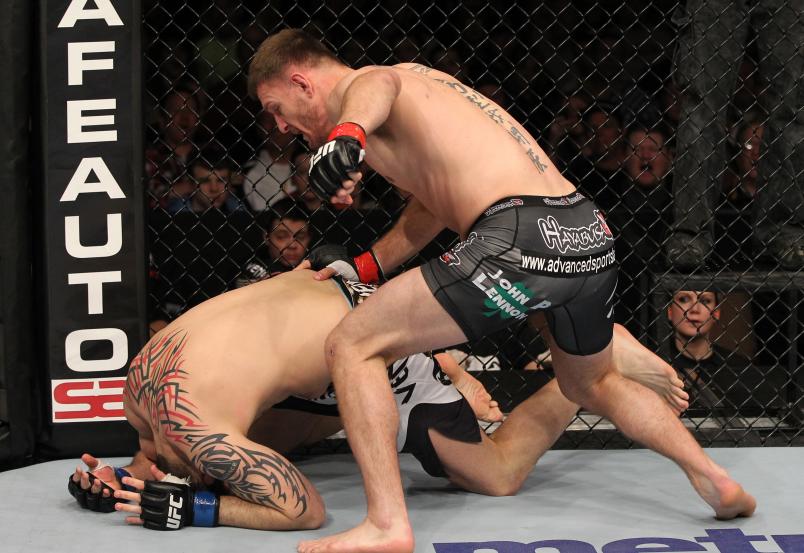 OMAHA, NE - FEBRUARY 15: (R-L) Stipe Miocic punches Phil De Fries during the UFC on FUEL TV event at Omaha Civic Auditorium on February 15, 2012 in Omaha, Nebraska. (Photo by Josh Hedges/Zuffa LLC/Zuffa LLC via Getty Images)