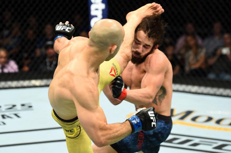 (L-R) Marlon Moraes of Brazil kicks Jimmie Rivera in the head in their bantamweight fight during the UFC Fight Night event at the Adirondack Bank Center on June 1, 2018 in Utica, New York. (Photo by Josh Hedges/Zuffa LLC via Getty Images)