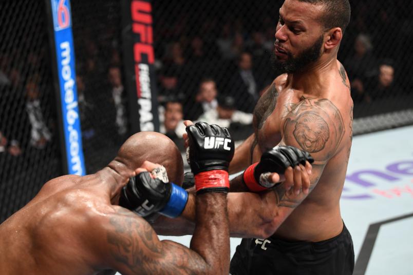 TORONTO, CANADA - DECEMBER 08: (R-L) Thiago Santos of Brazil punches Jimi Manuwa of England in their light heavyweight fight during the UFC 231 event at Scotiabank Arena on December 8, 2018 in Toronto, Canada. (Photo by Josh Hedges/Zuffa LLC/Zuffa LLC via Getty Images)