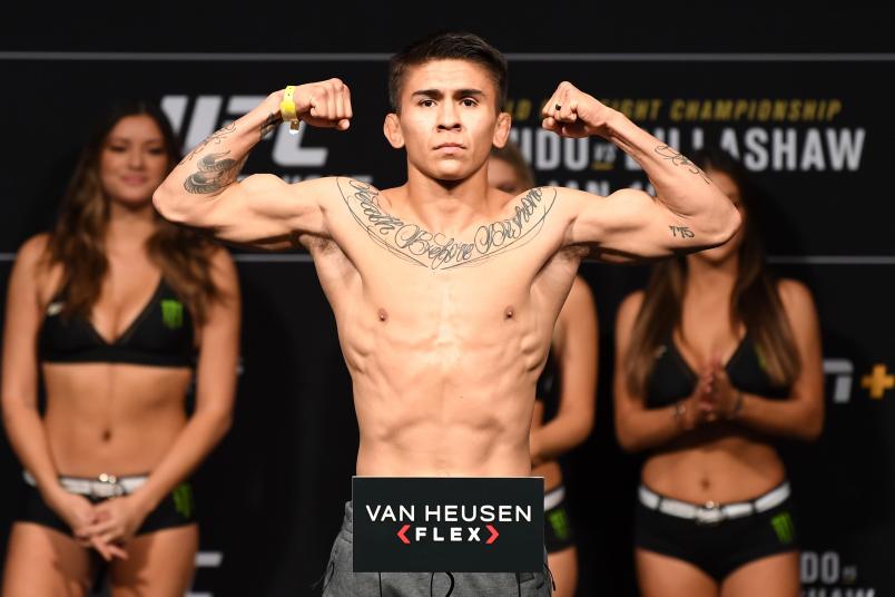 BROOKLYN, NEW YORK - JANUARY 18: Mario Bautista poses on the scale during the UFC Fight Night weigh-in at Barclays Center on January 18, 2019 in the Brooklyn borough of New York City. (Photo by Josh Hedges/Zuffa LLC/Zuffa LLC via Getty Images)
