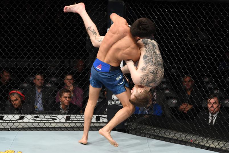 NEW YORK, NY - JANUARY 19: (R-L) Cory Sandhagen attempts to submit Mario Bautista in their bantamweight bout during the UFC Fight Night event at the Barclays Center on January 19, 2019 in the Brooklyn borough of New York City. (Photo by Josh Hedges/Zuffa LLC/Zuffa LLC via Getty Images)
