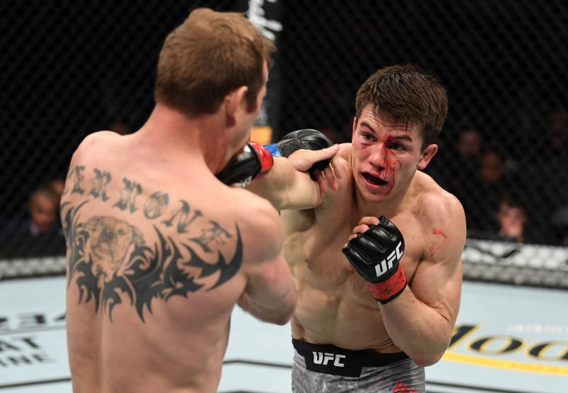 NEW YORK, NY - JANUARY 19: (R-L) Alexander Hernandez punches Donald Cerrone in their lightweight bout during the UFC Fight Night event at the Barclays Center on January 19, 2019 in the Brooklyn borough of New York City. (Photo by Josh Hedges/Zuffa LLC/Zuffa LLC via Getty Images)