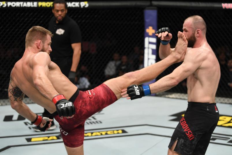 SAINT PETERSBURG, RUSSIA - APRIL 20: (L-R) Krzysztof Jotko of Poland kicks Alen Amedovski of Macedonia in their middleweight bout during the UFC Fight Night event at Yubileyny Sports Palace on April 20, 2019 in Saint Petersburg, Russia. (Photo by Jeff Bottari/Zuffa LLC/Zuffa LLC via Getty Images)