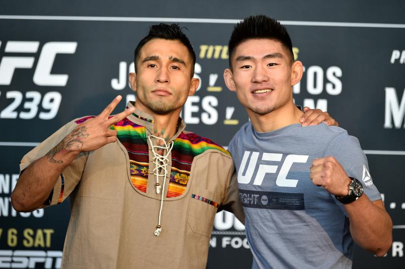LAS VEGAS, NEVADA - JULY 04: (L-R) Alejandro Perez of Mexico and Yadong Song of China pose for the media during the UFC 239 Ultimate Media Day at T-Mobile Arena on July 4, 2019 in Las Vegas, Nevada. (Photo by Chris Unger/Zuffa LLC/Zuffa LLC via Getty Images)