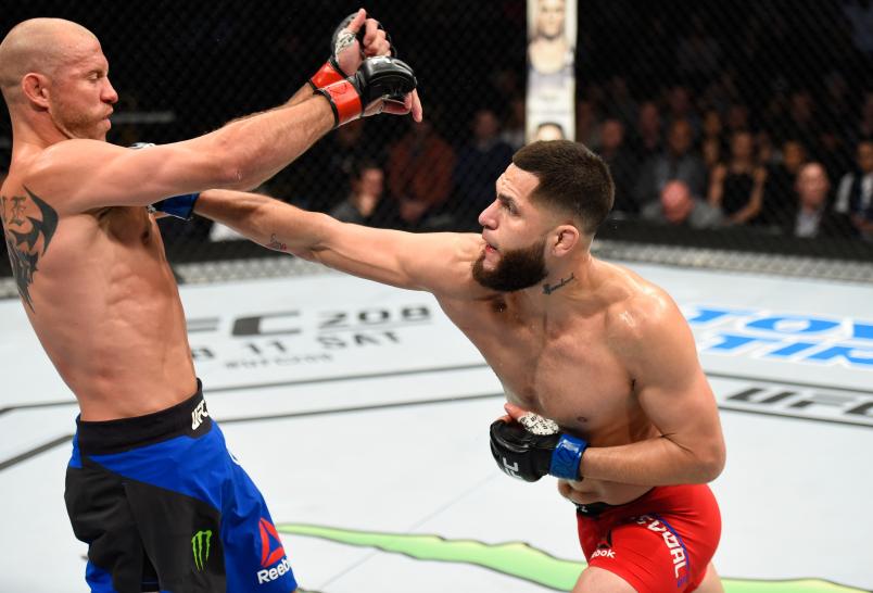 DENVER, CO - JANUARY 28: (R-L) Jorge Masvidal punches Donald Cerrone in their welterweight bout during the UFC Fight Night event at the Pepsi Center on January 28, 2017 in Denver, Colorado. (Photo by Josh Hedges/Zuffa LLC/Zuffa LLC via Getty Images)
