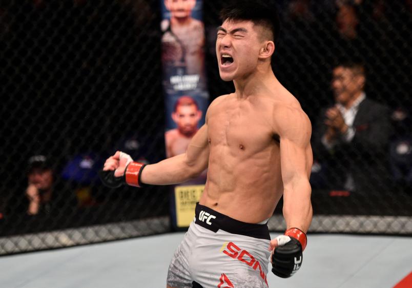 SHANGHAI, CHINA - NOVEMBER 25: Song Yadong of China celebrates after his victory over Bharat Kandare in their featherweight bout during the UFC Fight Night event inside the Mercedes-Benz Arena on November 25, 2017 in Shanghai, China. (Photo by Brandon Magnus/Zuffa LLC via Getty Images)