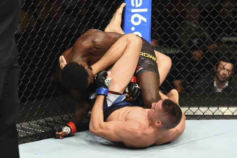 Niko Price punches Randy Brown of Jamaica in their welterweight fight during the UFC Fight Night event inside CenturyLink Arena on July 14, 2018 in Boise, Idaho. (Photo by Josh Hedges/Zuffa LLC/Zuffa LLC via Getty Images)