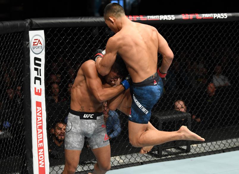 MONCTON, NB - OCTOBER 27: (R-L) Andre Soukhamthath lands a flying knee against Jonathan Martinez in their bantamweight bout during the UFC Fight Night event inside Avenir Centre on October 27, 2018 in Moncton, New Brunswick, Canada. (Photo by Jeff Bottari/Zuffa LLC/Zuffa LLC via Getty Images)