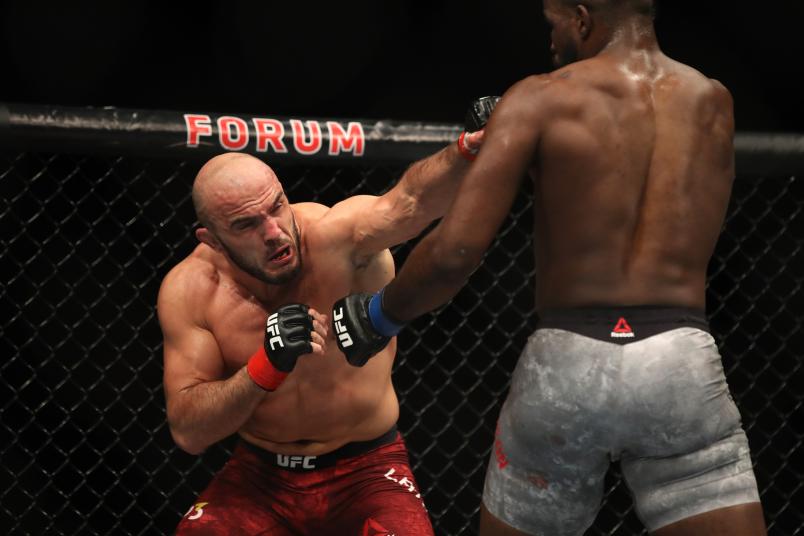 INGLEWOOD, CA - DECEMBER 29: (L-R) Ilir Latifi of Sweden punches Corey Anderson in their light heavyweight bout during the UFC 232 event inside The Forum on December 29, 2018 in Inglewood, California. (Photo by Christian Petersen/Zuffa LLC/Zuffa LLC via Getty Images)