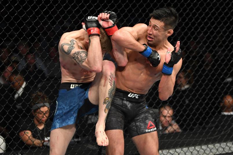 NASHVILLE, TENNESSEE - MARCH 23: (R-L) Chris Gutierrez elbows Ryan MacDonald in their bantamweight bout during the UFC Fight Night event at Bridgestone Arena on March 23, 2019 in Nashville, Tennessee. (Photo by Jeff Bottari/Zuffa LLC/Zuffa LLC via Getty Images)