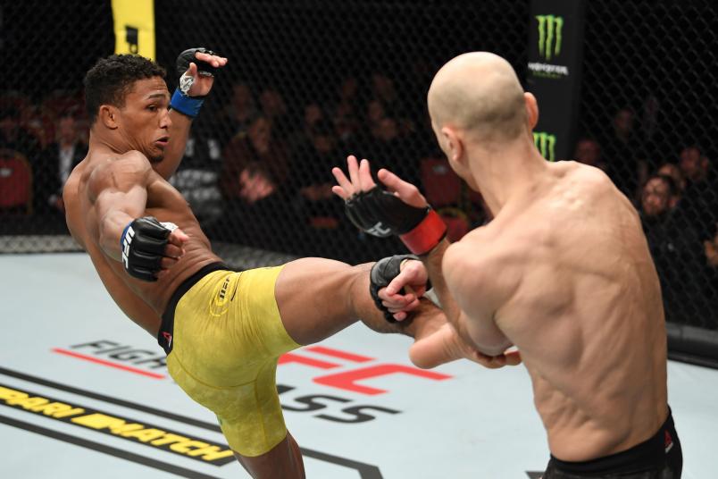 SAINT PETERSBURG, RUSSIA - APRIL 20: (L-R) Alex da Silva of Brazil kicks Alexander Yakovlev of Russia in their lightweight bout during the UFC Fight Night event at Yubileyny Sports Palace on April 20, 2019 in Saint Petersburg, Russia. (Photo by Jeff Bottari/Zuffa LLC)