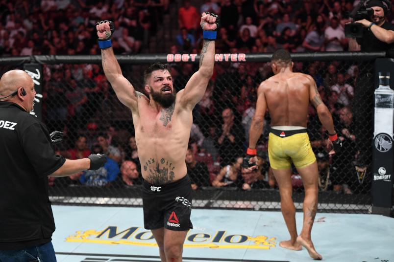 SUNRISE, FL - APRIL 27: (L-R) Mike Perry reacts after the conclusion of his welterweight bout against Alex Oliveira of Brazil during the UFC Fight Night event at BB&T Center on April 27, 2019 in Sunrise, Florida. (Photo by Jeff Bottari/Zuffa LLC)