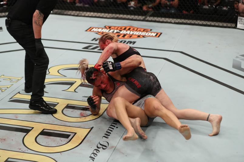 Valentina Shevchenko of Kyrgyzstan (top) punches Priscila Cachoeira of Brazil in their women's flyweight bout during the UFC Fight Night event at Mangueirinho Arena on February 03, 2018 in Belem, Brazil. (Photo by Buda Mendes/Zuffa LLC via Getty Images)