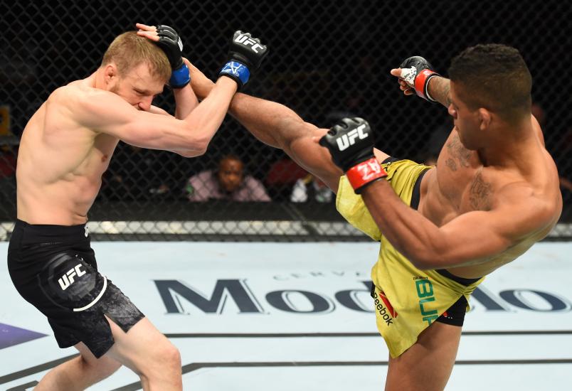 Gilbert Burns of Brasil kicks Dan Moret in their lightweight fight during the UFC Fight Night event at the Gila Rivera Arena on April 14, 2018 in Glendale, Arizona. (Photo by Josh Hedges/Zuffa LLC via Getty Images)