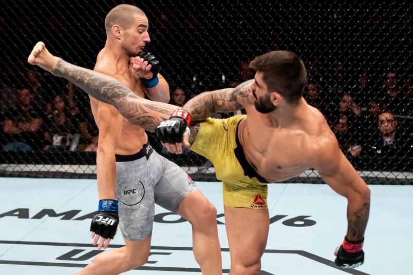 RIO DE JANEIRO, BRAZIL - MAY 12: Elizeu Zaleski dos Santos ( R) of Brazil kicks Sean Strickland of the United States in their welterweight bout during the UFC 224 event at Jeunesse Arena on May 12, 2018 in Rio de Janeiro, Brazil. (Photo by Buda Mendes/Zuffa LLC/Zuffa LLC)