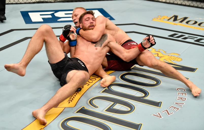 LAS VEGAS, NV - JULY 06: (R-L) Oskar Piechota of Poland attempts to secure a choke submission against Gerald Meerschaert in their middleweight bout during The Ultimate Fighter Finale event inside The Pearl concert theater at Palms Casino Resort on July 6, 2018 in Las Vegas, Nevada. (Photo by Jeff Bottari/Zuffa LLC)