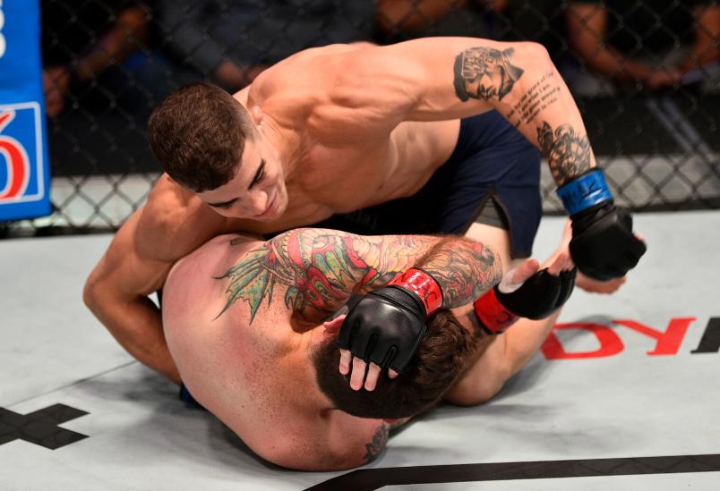 Joe Solecki punches James Wallace in their lightweight bout during Dana White's Contender Series at the UFC Apex on July 9, 2019 in Las Vegas, Nevada. (Photo by Chris Unger/DWCS LLC)