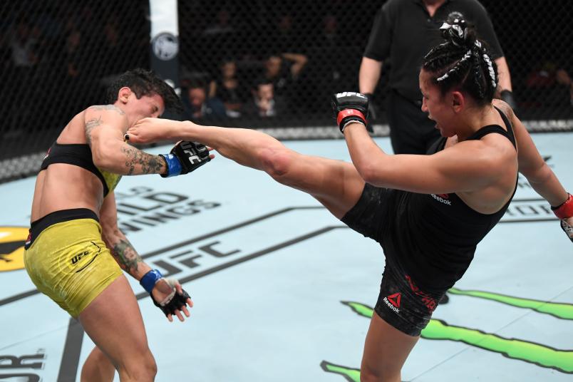 SUNRISE, FL - APRIL 27: (R-L) Carla Esparza kicks Virna Jandiroba of Brazil in their women's strawweight bout during the UFC Fight Night event at BB&T Center on April 27, 2019 in Sunrise, Florida. (Photo by Jeff Bottari/Zuffa LLC/Zuffa LLC via Getty Images)
