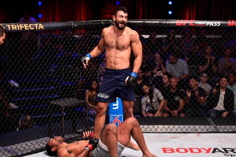 LAS VEGAS, NV - JULY 16: (R-L) Antonio Arroyo of Brazil reacts after defeating Stephen Regman by submission in their middleweight bout during Dana White's Contender Series at the UFC Apex on July 16, 2019 in Las Vegas, Nevada. (Photo by Chris Unger/DWCS LLC)