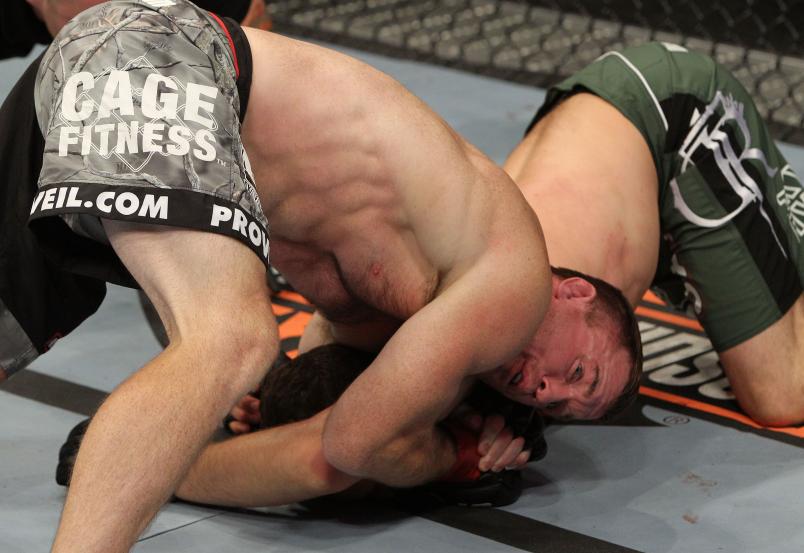 OAKLAND, CA - AUGUST 07: Matt Hughes chokes Ricardo Almeida during the UFC Welterweight bout at Oracle Arena on August 7, 2010 in Oakland, California. (Photo by Josh Hedges/Zuffa LLC/Zuffa LLC via Getty Images)
