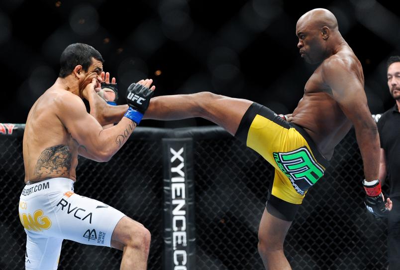 LAS VEGAS, NV - FEBRUARY 05: (R-L) Anderson Silva lands a kick to the jaw of Vitor Belfort that knocked out the Brazilian challenger at UFC 126 at the Mandalay Bay Resort and Casino on February 5, 2011 in Las Vegas, Nevada. (Photo by James Law/Zuffa LLC)