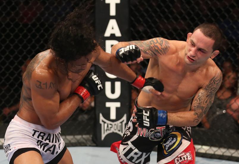 DENVER, CO - AUGUST 11: (R-L) Frankie Edgar punches Benson Henderson during their lightweight championship bout at UFC 150 inside Pepsi Center on August 11, 2012 in Denver, Colorado. (Photo by Nick Laham/Zuffa LLC/Zuffa LLC via Getty Images)