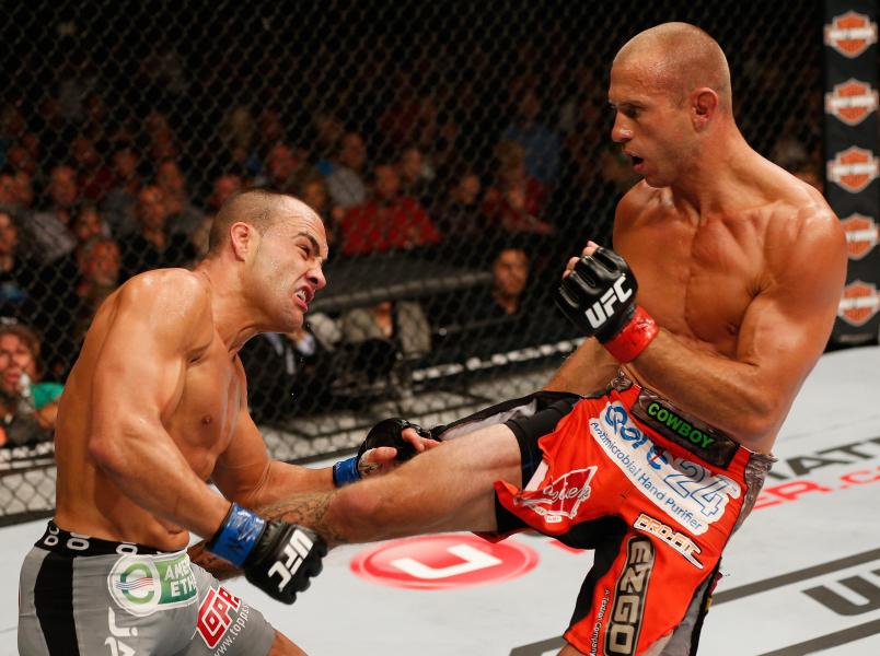 Donald "Cowboy" Cerrone kicks Eddie Alvarez in their lightweight fight during the UFC 178 event inside the MGM Grand Garden Arena on September 27, 2014 in Las Vegas, Nevada. (Photo by Josh Hedges/Zuffa LLC via Getty Images)