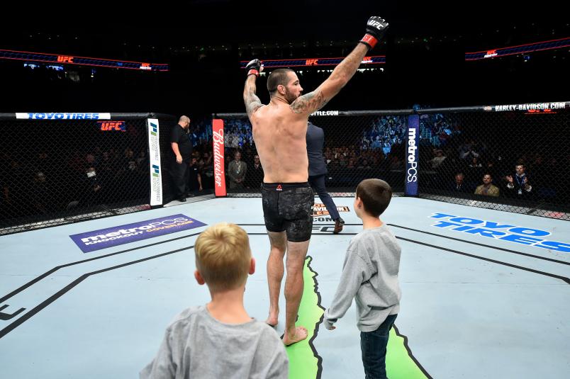 Matt Brown celebrates with his children after defeating Diego Sanchez in their welterweight bout during the UFC Fight Night event inside the Ted Constant Convention Center on November 11, 2017 in Norfolk, Virginia. Matt Brown won by KO. (Photo by Brandon Magnus/Zuffa LLC via Getty Images)