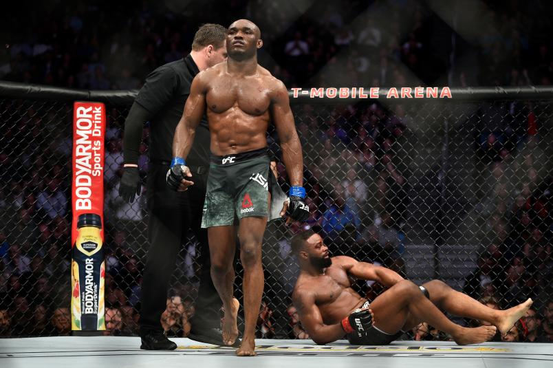 LAS VEGAS, NEVADA - MARCH 02: (L-R) Kamaru Usman of Nigeria walks back to his corner after the a round of his welterweight championship bout against Tyron Woodley during the UFC 235 event at T-Mobile Arena on March 2, 2019 in Las Vegas, Nevada. (Photo by Chris Unger/Zuffa LLC)
