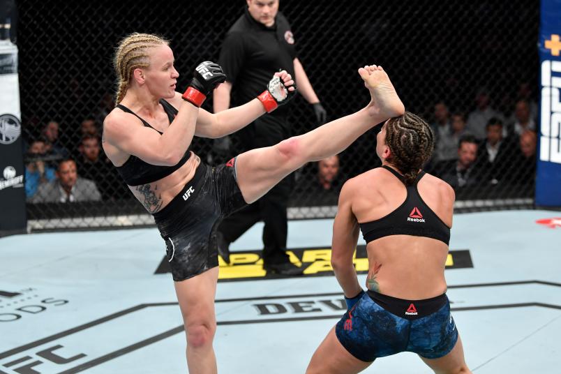 CHICAGO, IL - JUNE 08: (L-R) Valentina Shevchenko of Kyrgyzstan knocks out Jessica Eye in their women's flyweight championship bout during the UFC 238 event at the United Center on June 8, 2019 in Chicago, Illinois. (Photo by Jeff Bottari/Zuffa LLC)