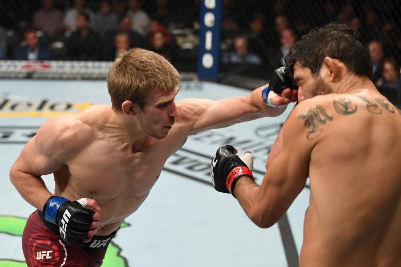 LAS VEGAS, NV - JULY 06: Arnold Allen of England punches Gilbert Melendez in their featherweight fight during the UFC 239 event at T-Mobile Arena on July 6, 2019 in Las Vegas, Nevada. (Photo by Josh Hedges/Zuffa LLC/Zuffa LLC)