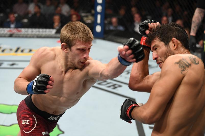 LAS VEGAS, NV - JULY 06: Arnold Allen of England punches Gilbert Melendez in their featherweight fight during the UFC 239 event at T-Mobile Arena on July 6, 2019 in Las Vegas, Nevada. (Photo by Josh Hedges/Zuffa LLC/Zuffa LLC)