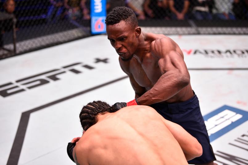 LAS VEGAS, NV - JULY 16: (R-L) Ode Osbourne of Jamaica punches Armando Villarreal in their bantamweight bout during Dana White's Contender Series at the UFC Apex on July 16, 2019 in Las Vegas, Nevada. (Photo by Chris Unger/DWCS LLC)