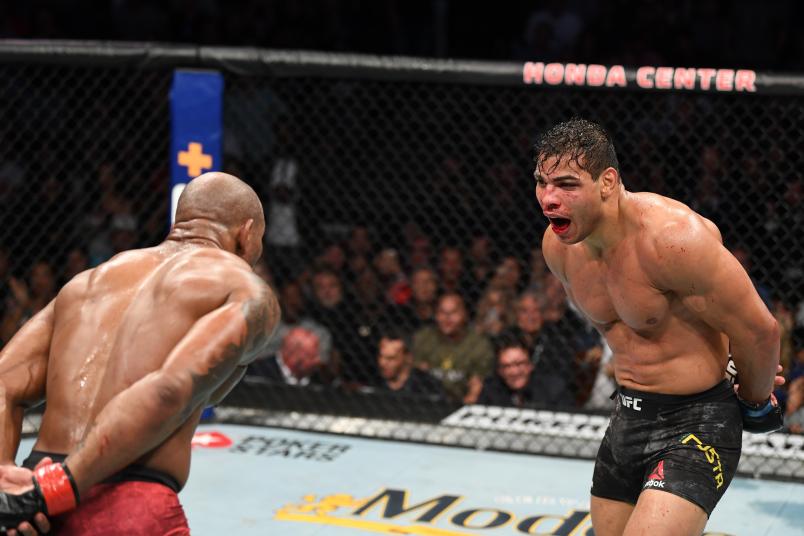 Paulo Costa of Brazil and Yoel Romero of Cuba taunt each other in their middleweight bout during the UFC 241 event at the Honda Center on August 17, 2019 in Anaheim, California. (Photo by Josh Hedges/Zuffa LLC via Getty Images)