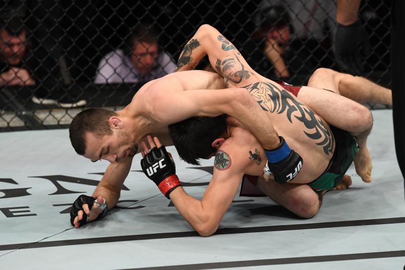 MEXICO CITY, MEXICO - SEPTEMBER 21: (L-R) Askar Askarov of Russia and Brandon Moreno of Mexico grapple in their flyweight bout during the UFC Fight Night event on September 21, 2019 in Mexico City, Mexico. (Photo by Josh Hedges/Zuffa LLC/Zuffa LLC via Getty Images)