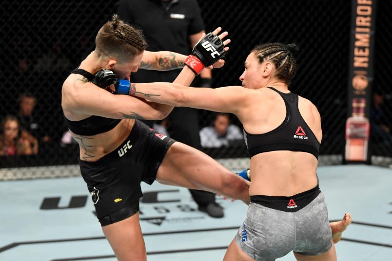 COPENHAGEN, DENMARK - SEPTEMBER 28: (R-L) Lina Lansberg of Sweden punches Macy Chiasson in their women's bantamweight bout during the UFC Fight Night event at Royal Arena on September 28, 2019 in Copenhagen, Denmark. (Photo by Jeff Bottari/Zuffa LLC/Zuffa LLC via Getty Images)