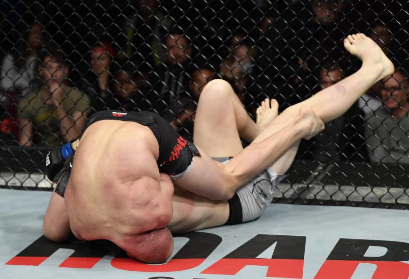 VANCOUVER, BRITISH COLUMBIA - SEPTEMBER 14: Misha Cirkunov of Latvia secures a guillotine choke submission against Jimmy Crute of Australia in their light heavyweight bout during the UFC Fight Night event at Rogers Arena on September 14, 2019 in Vancouver, Canada. (Photo by Jeff Bottari/Zuffa LLC/Zuffa LLC)