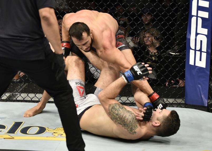 BOSTON, MASSACHUSETTS - OCTOBER 18: (L-R) Dominick Reyes punches Chris Weidman in their light heavyweight bout during the UFC Fight Night event at TD Garden on October 18, 2019 in Boston, Massachusetts. (Photo by Chris Unger/Zuffa LLC via Getty Images)