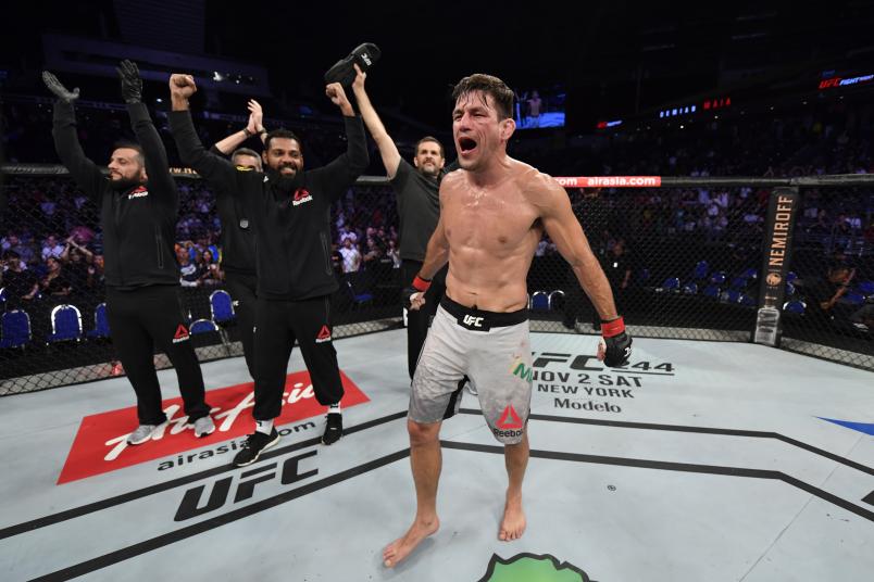 SINGAPORE, SINGAPORE - OCTOBER 26: Demian Maia of Brazil celebrates his submission victory over Ben Askren in their welterweight bout during the UFC Fight Night event at Singapore Indoor Stadium on October 26, 2019 in Singapore. (Photo by Jeff Bottari/Zuffa LLC via Getty Images)