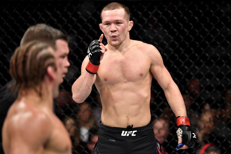 LAS VEGAS, NEVADA - DECEMBER 14: Petr Yan of Russia taunts Urijah Faber in their bantamweight bout during the UFC 245 event at T-Mobile Arena on December 14, 2019 in Las Vegas, Nevada. (Photo by Jeff Bottari/Zuffa LLC)