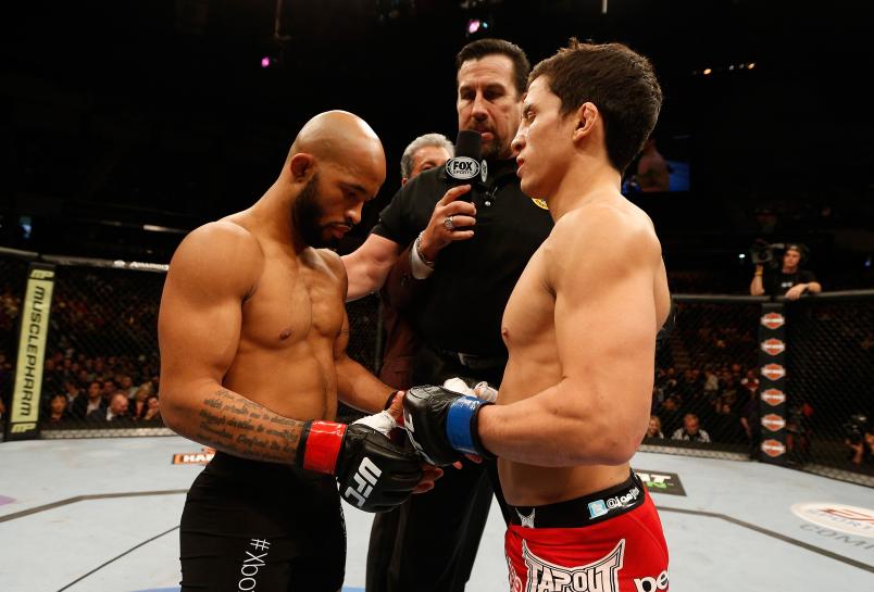 SACRAMENTO, CA - DECEMBER 14: (L-R) Demetrious Johnson and Joseph Benavidez touch gloves before their flyweight championship bout during the UFC on FOX event at Sleep Train Arena on December 14, 2013 in Sacramento, California. (Photo by Josh Hedges/Zuffa LLC)